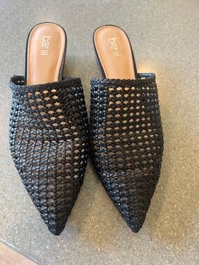 These black woven flat mules are from the brand Bar III.